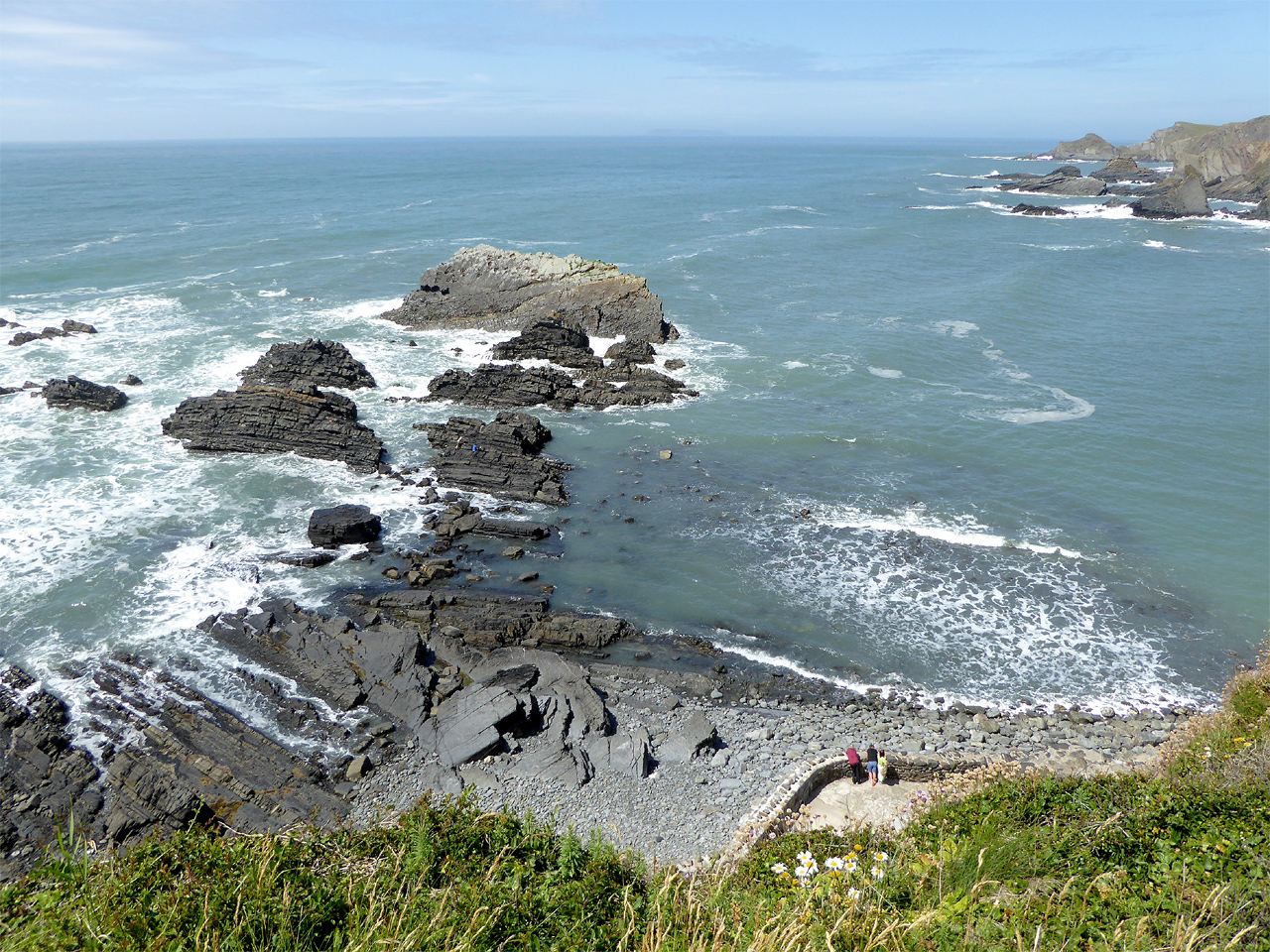 best dog-friendly beaches devon - Beach and coastline rocks by Hartland Quay, Devon