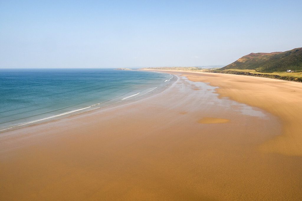 is rhossili beach dog friendly - Rhossili Bay beach, Gower Peninsula, Wales