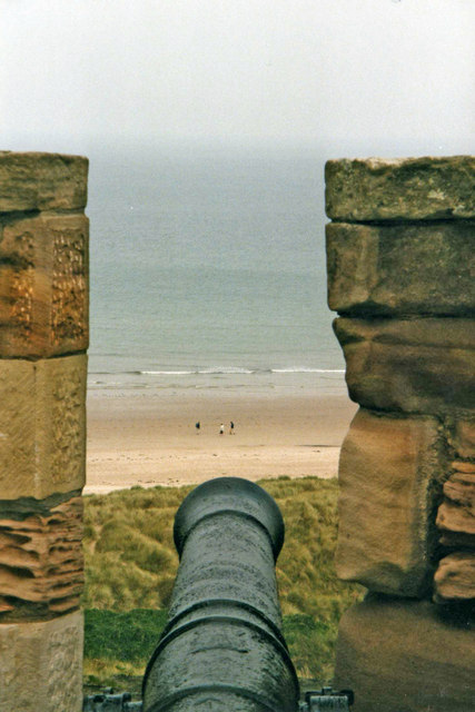 dog friendly spring breaks uk - Bamburgh Beach from Castle, Northumberland